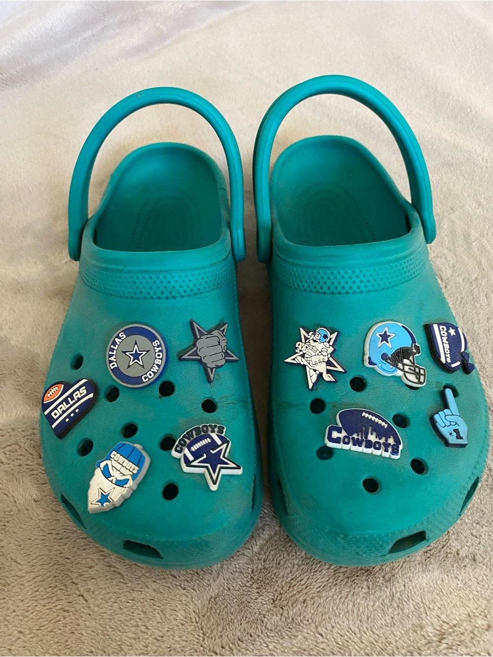 Croc sandals wirh Dallas Cowboys charms